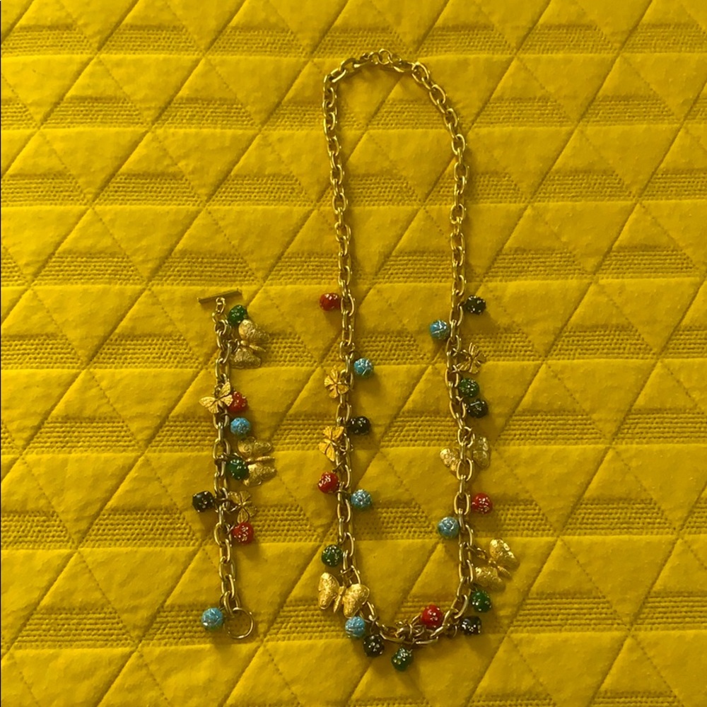 Gold chain styled necklace and bracelet